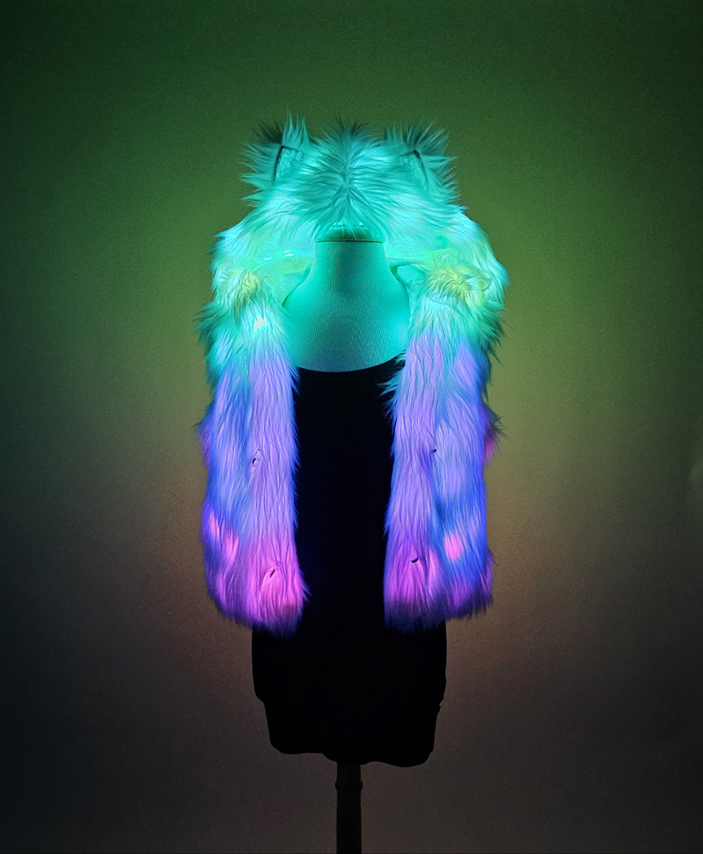 Mannequin wearing LED vest with blue, purple and pink lights