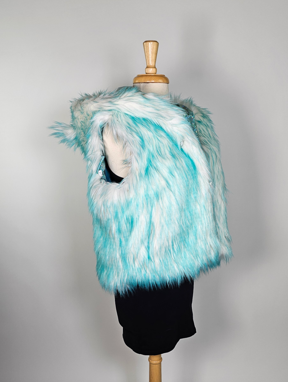 Mannequin wearing aqua faux fur vest