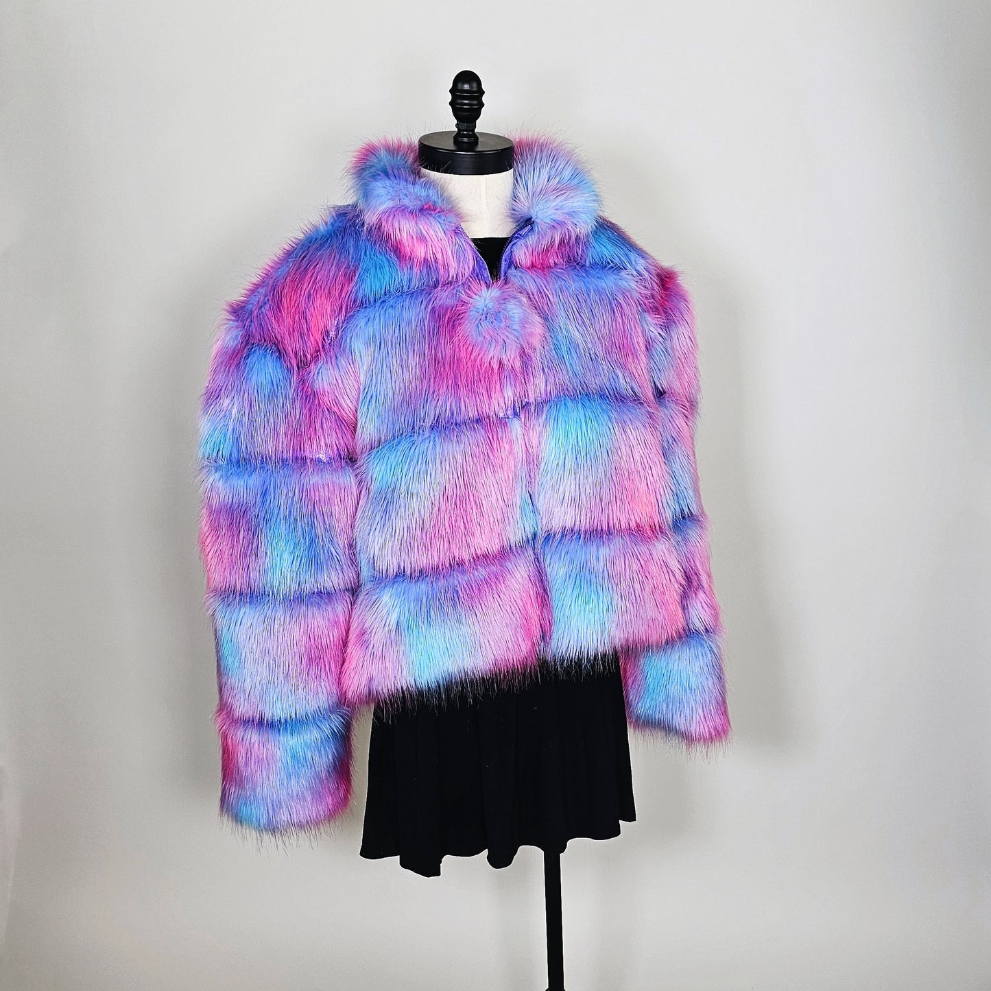 Colorful faux fur coat with puffer stripes in fur