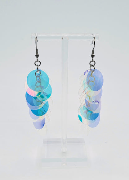 iridescent sequin earrings on white background