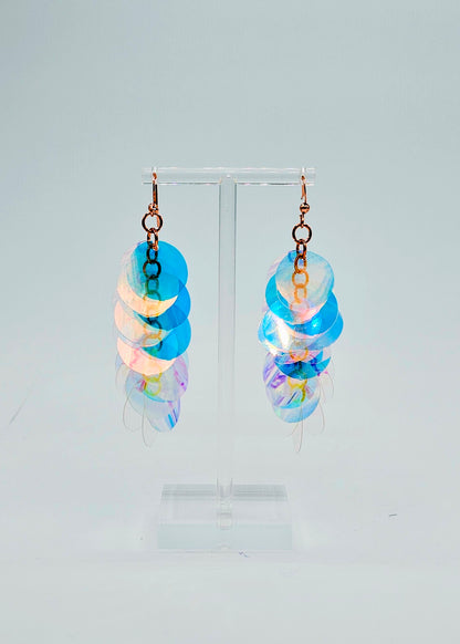iridescent sequin earrings on white background