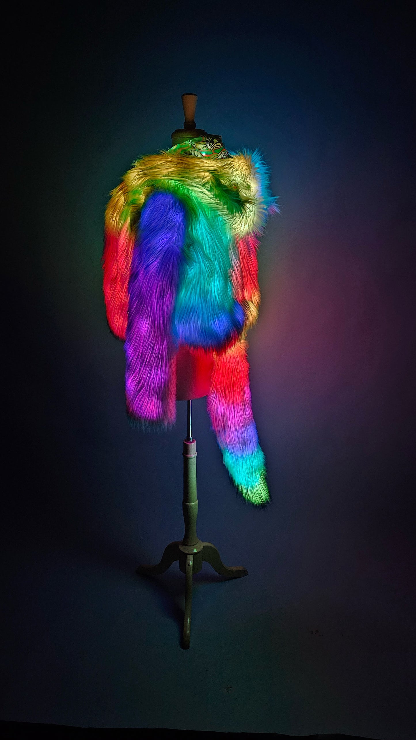 Custom made faux fur coat and matching tail illuminated with rainbow color leds.