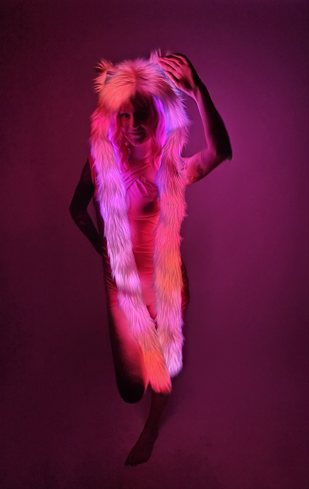 Faux fur hood with pink LEDs