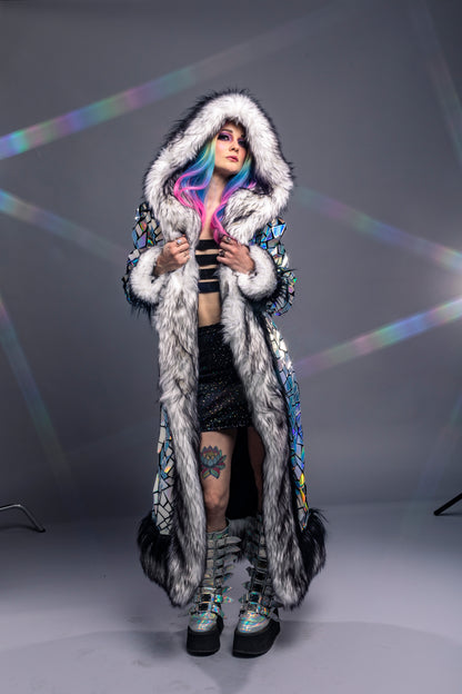 model wearing silver holographic coat with LED fur trim