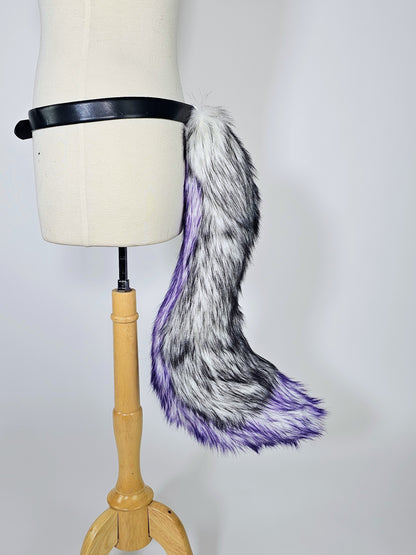 Mannequin wearing LED tail with black and purple faux fur