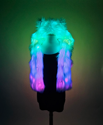 Mannequin wearing LED vest with blue, purple and pink lights