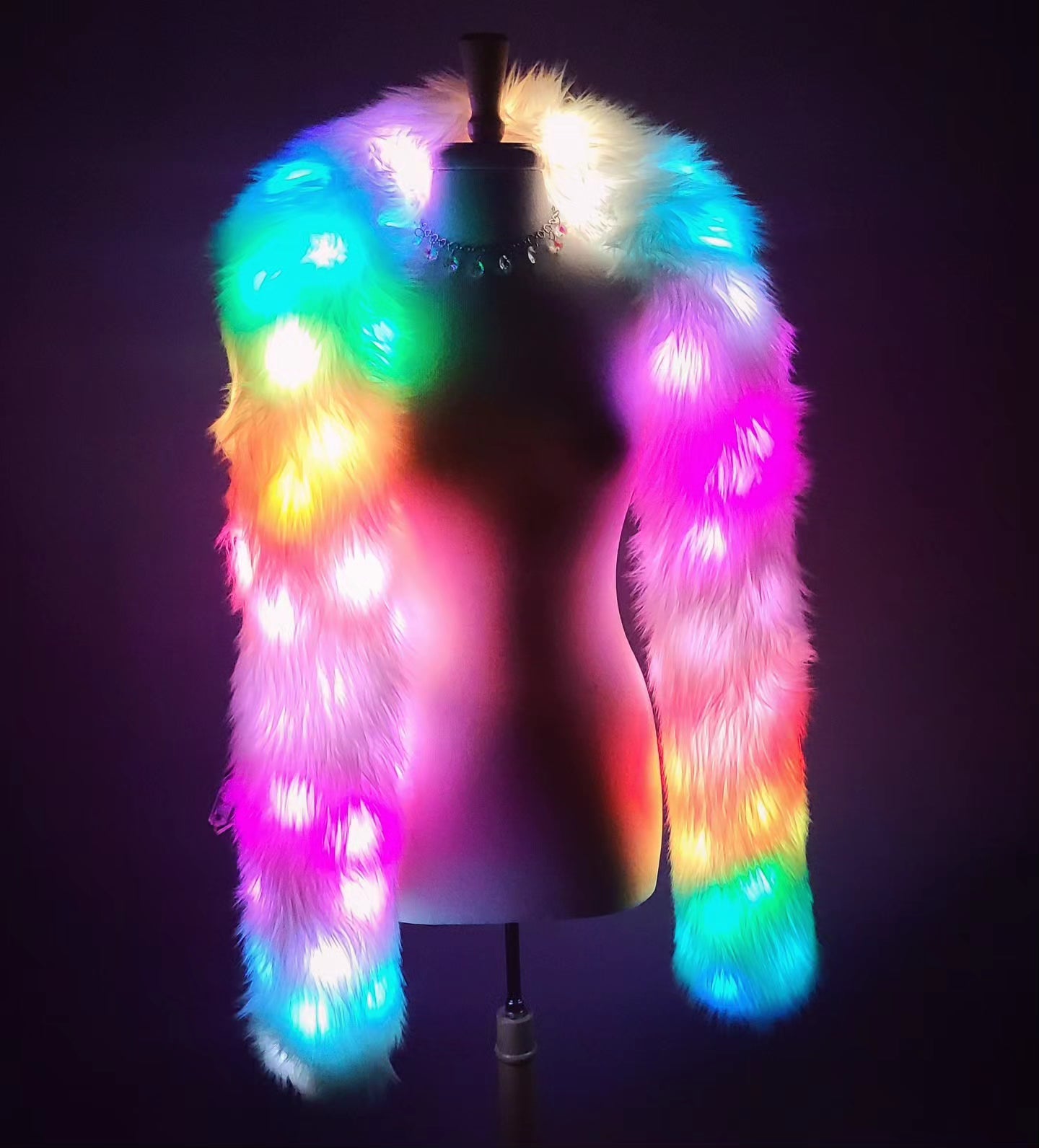 White faux fur Glow Worm scarf with multicolor LEDs.