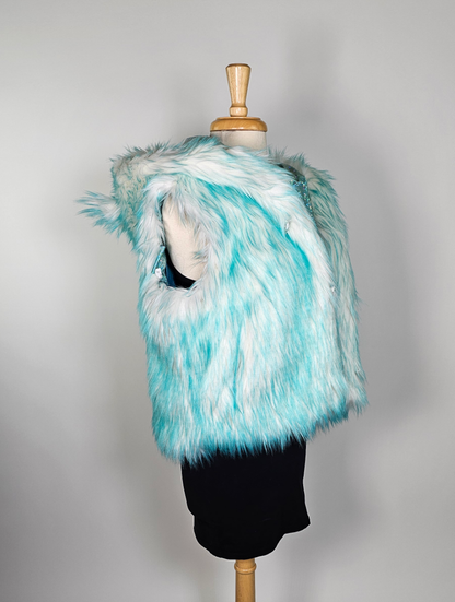 Mannequin wearing aqua faux fur vest
