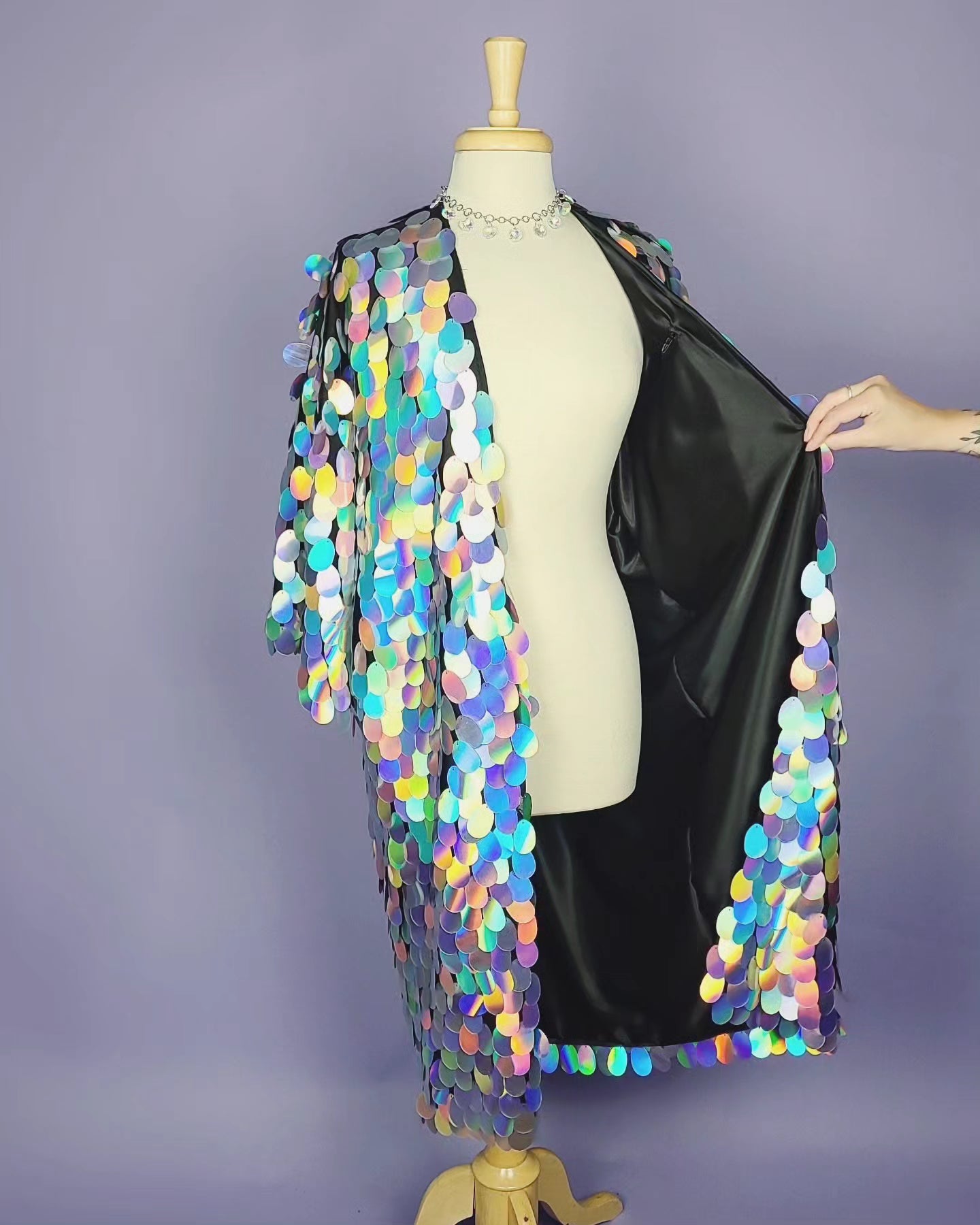 Kimono made with large silver sequins and a black satin lining