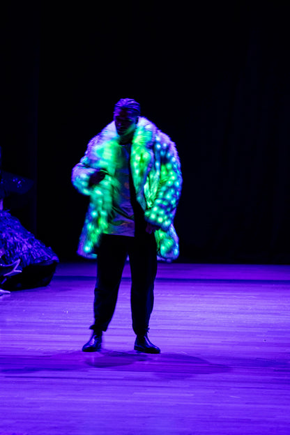 model wearing faux fur LED coat