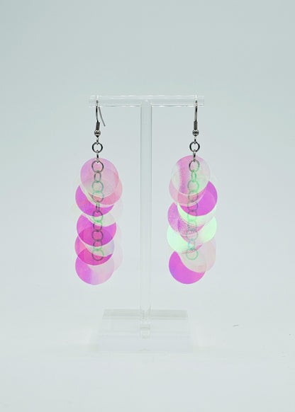 iridescent sequin earrings on white background