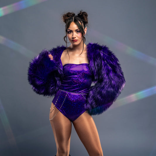 model wearing purple faux fur jacket