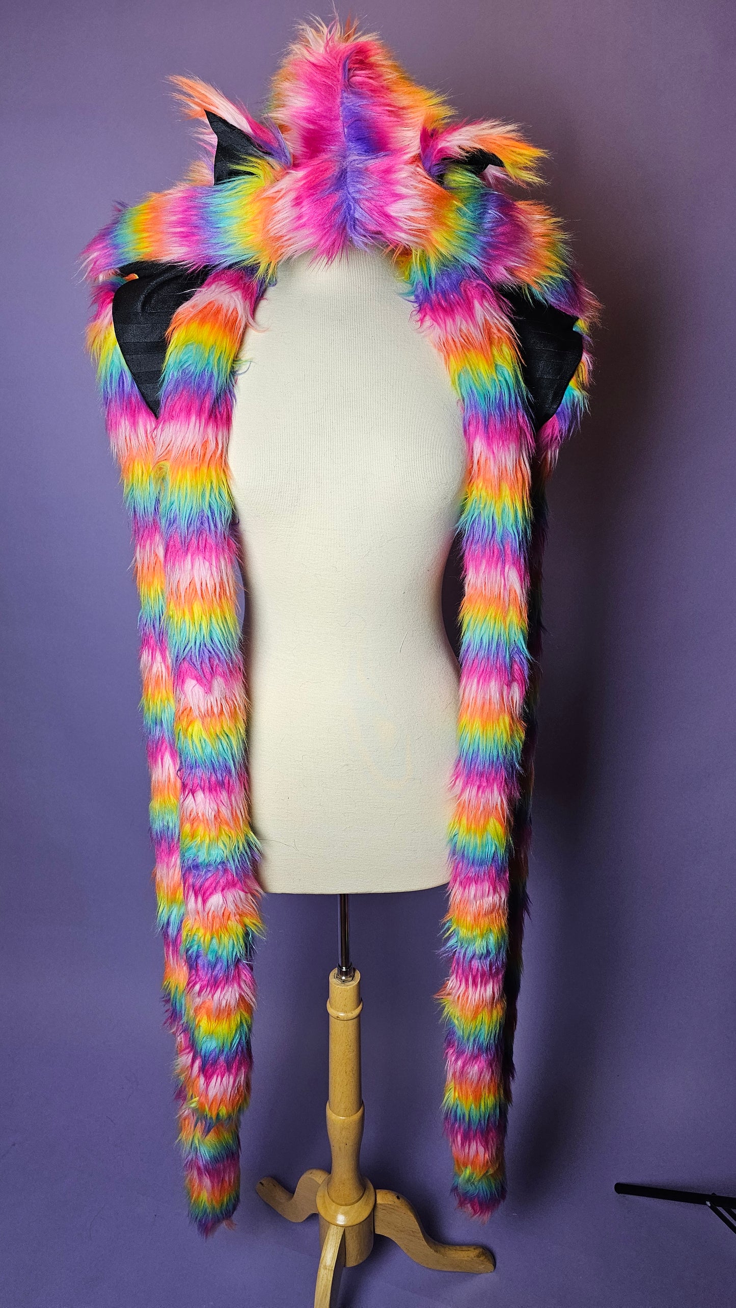 Rainbow faux fur tentacle hood with animal ears.