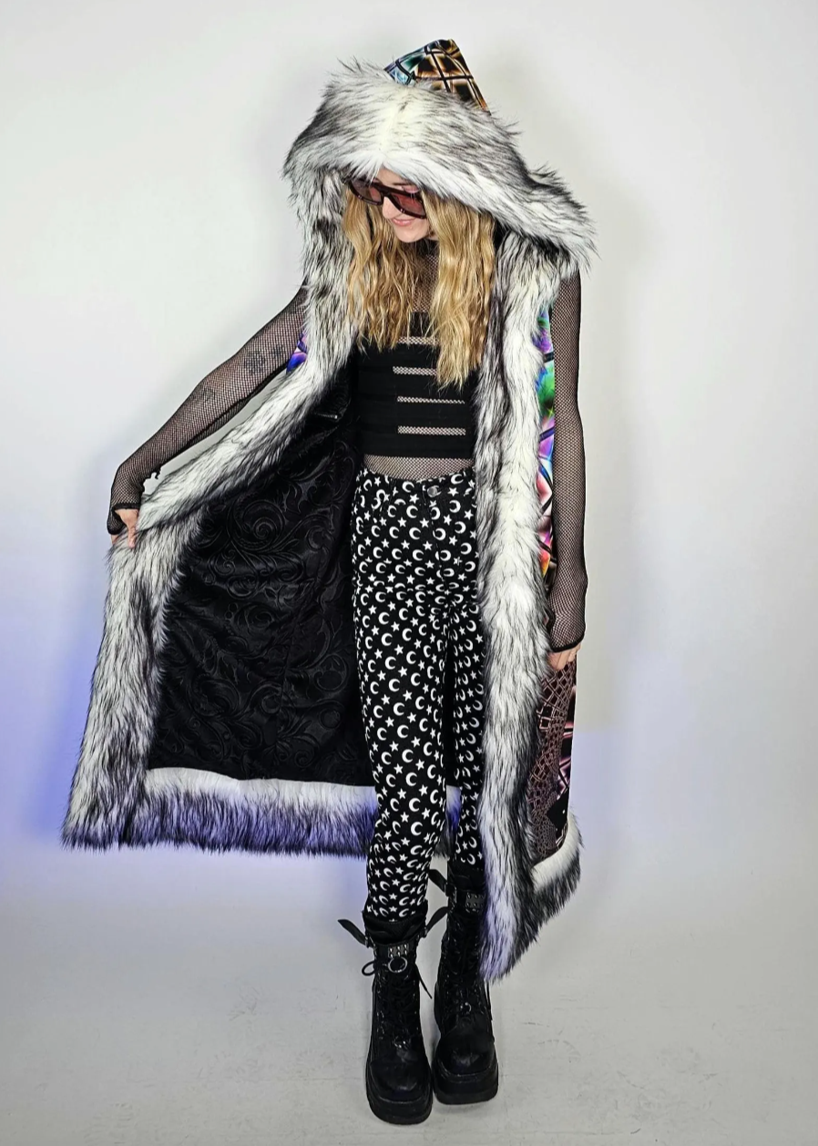 Person wearing duster with faux fur hood