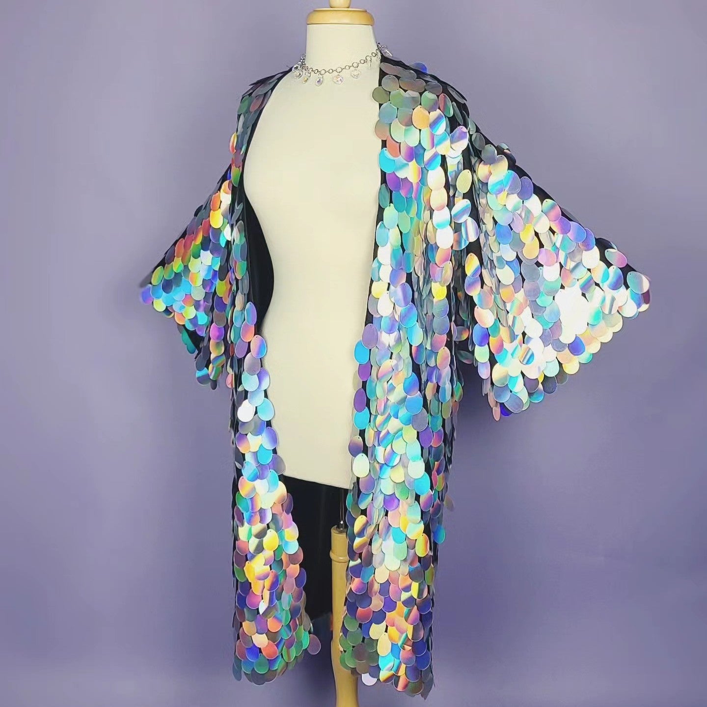 Kimono made with large silver sequins and a black satin lining