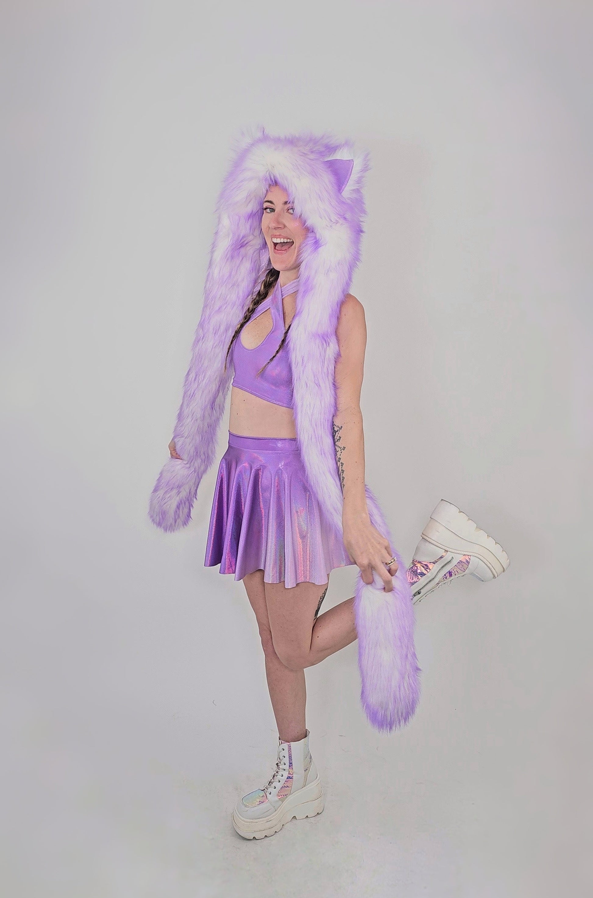 Model wearing lavender faux fur hood