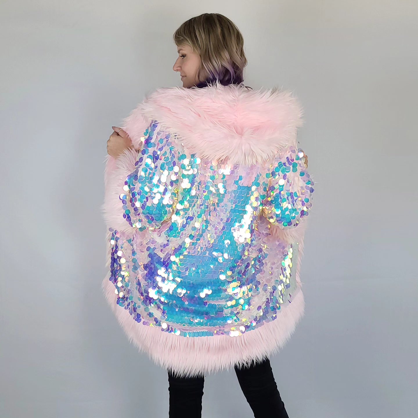 Iridescent sequin jacket with light pink faux fur trim.