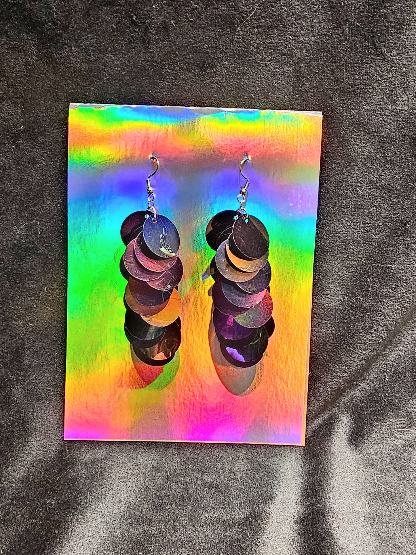 Black iridescent sequin earrings with silver stainless steel hardware.