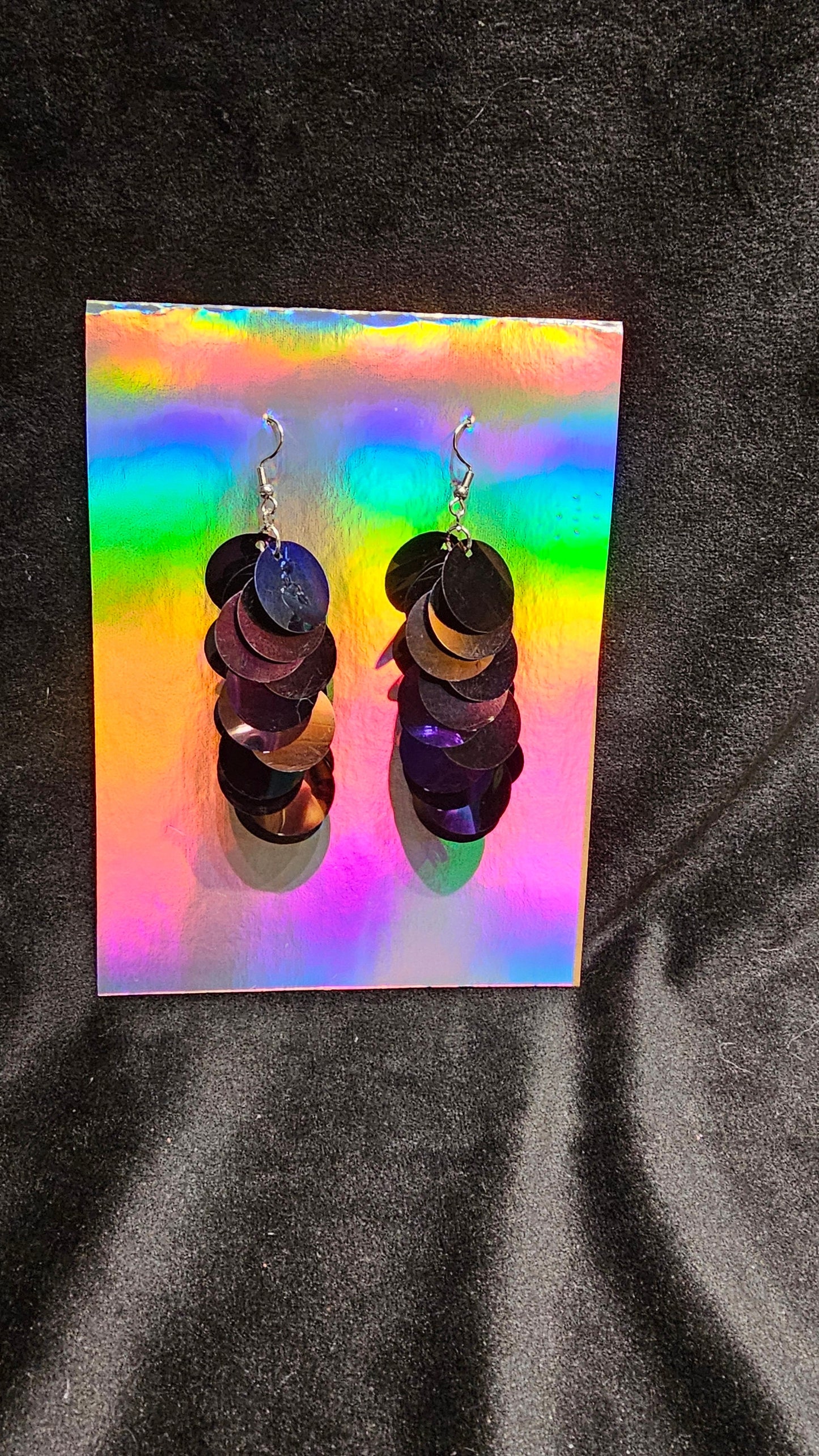 Black iridescent sequin earrings with silver stainless steel hardware.