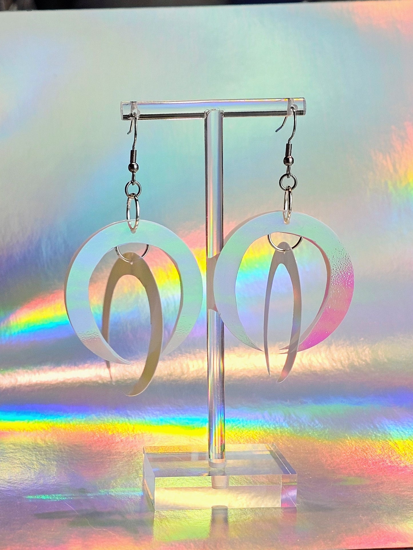 Iridescent white sequin earrings in crescent moon shape