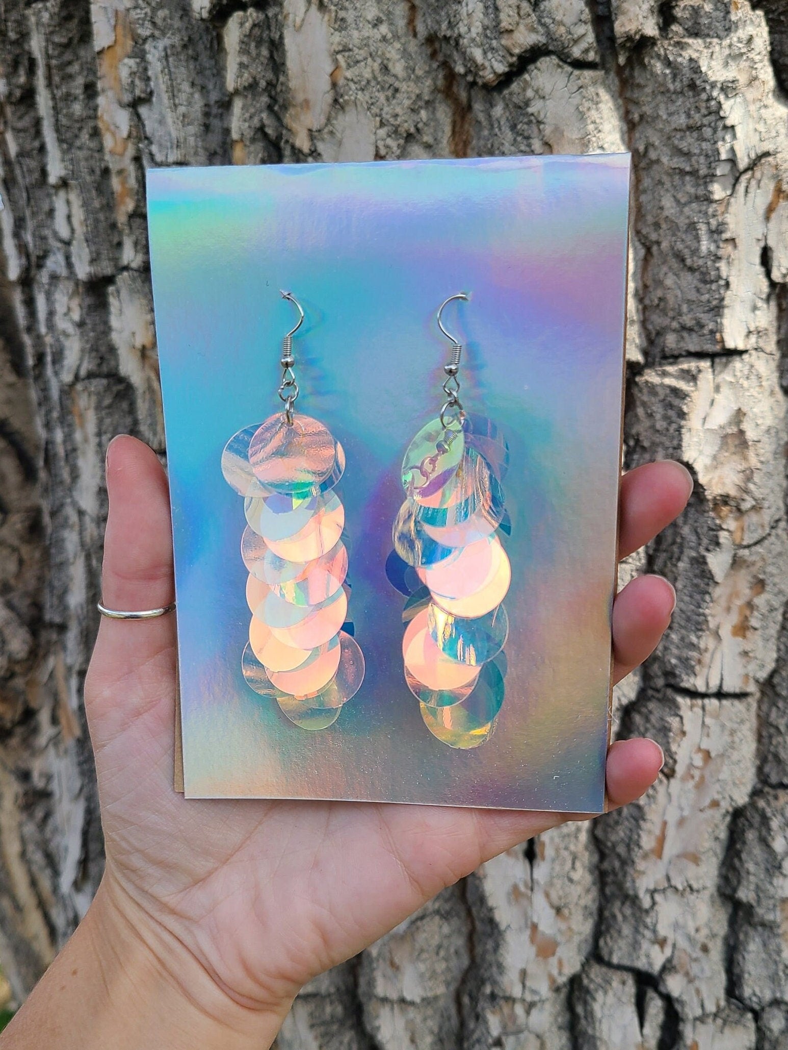 Iridescent sequin drop earrings with silver stainless steel hardware.