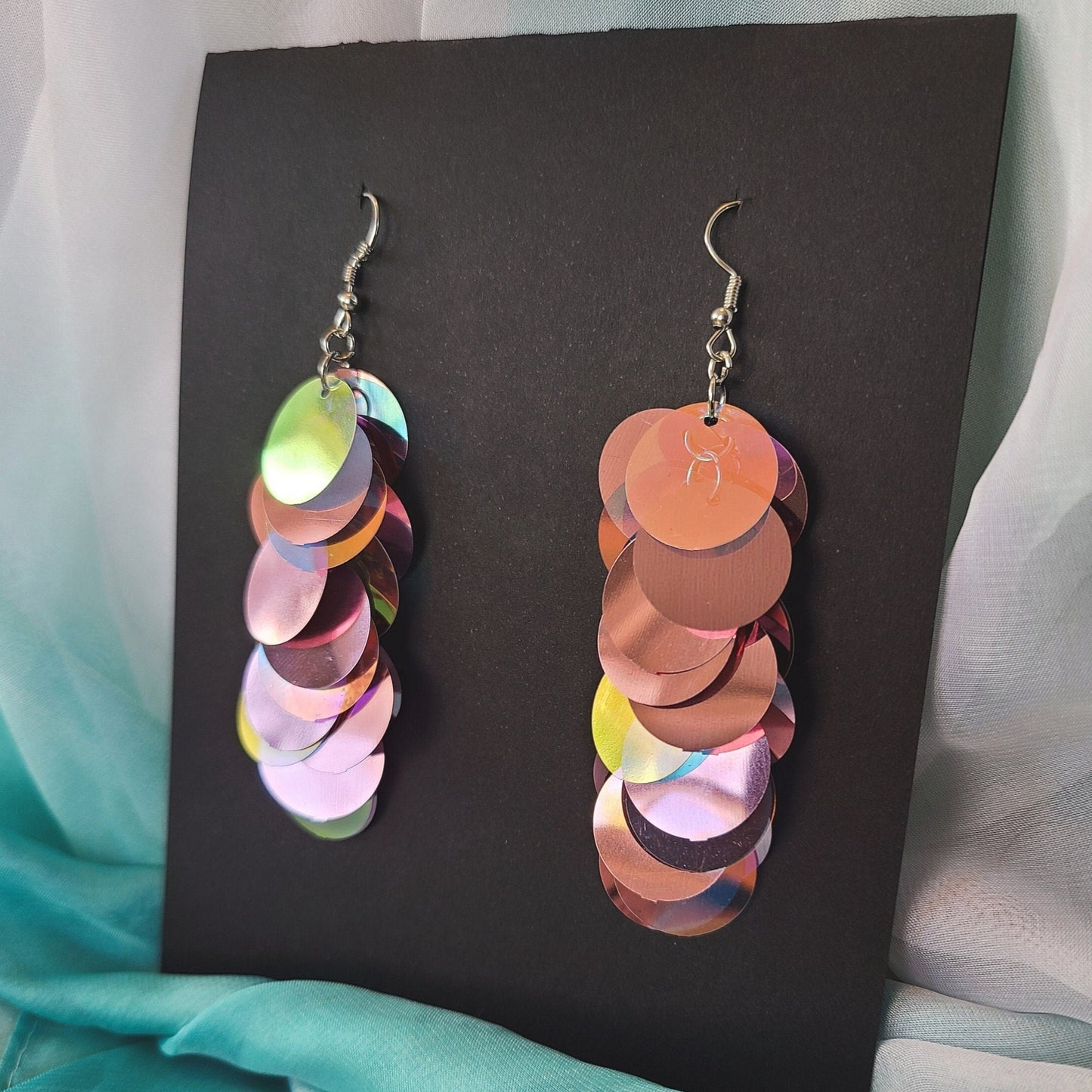 Metallic pink sequin drop earrings with silver stainless steel hardware.